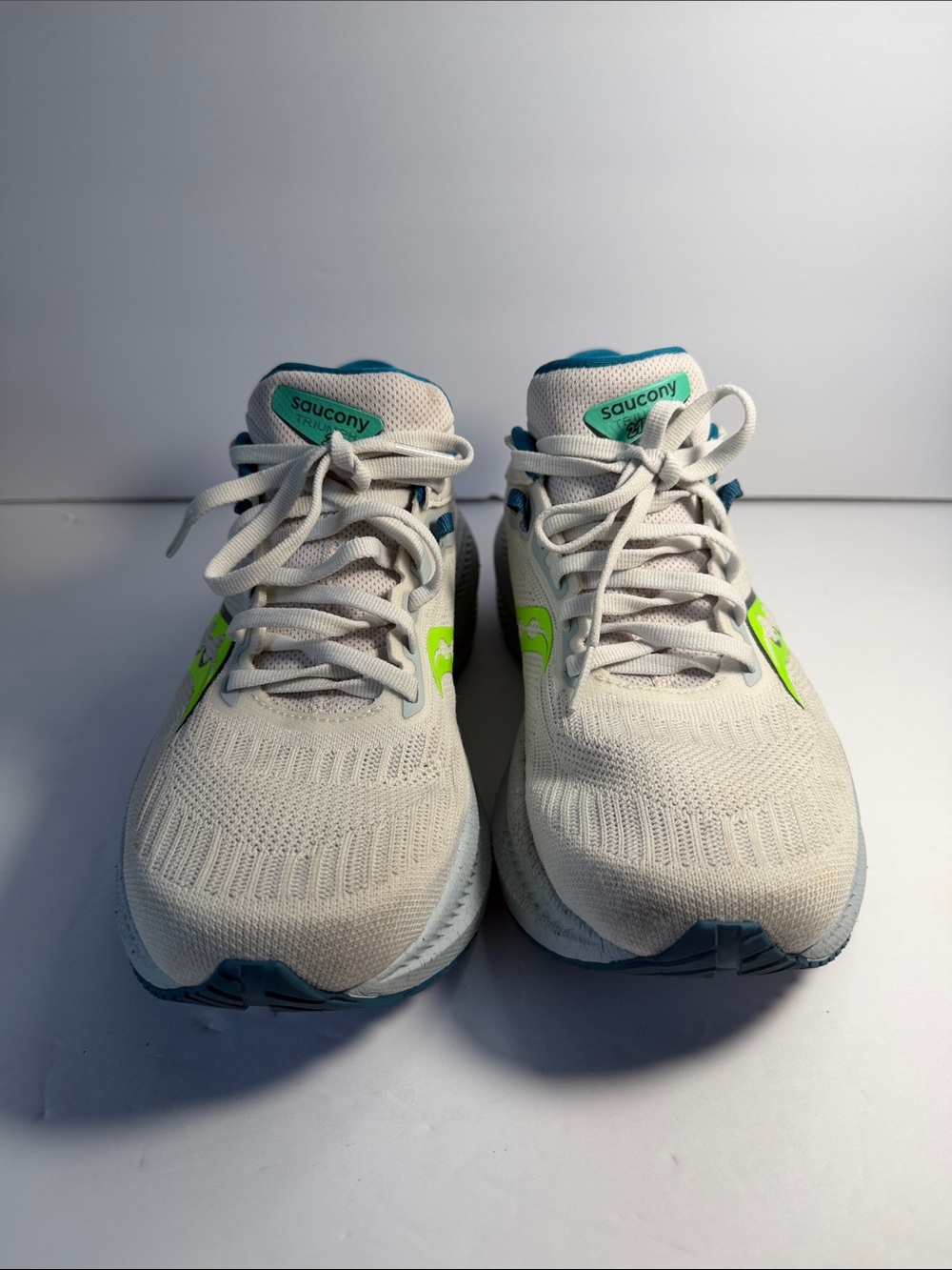 Saucony White Running Shoes with Neon Green and Teal Accents - Picture 3 of 9